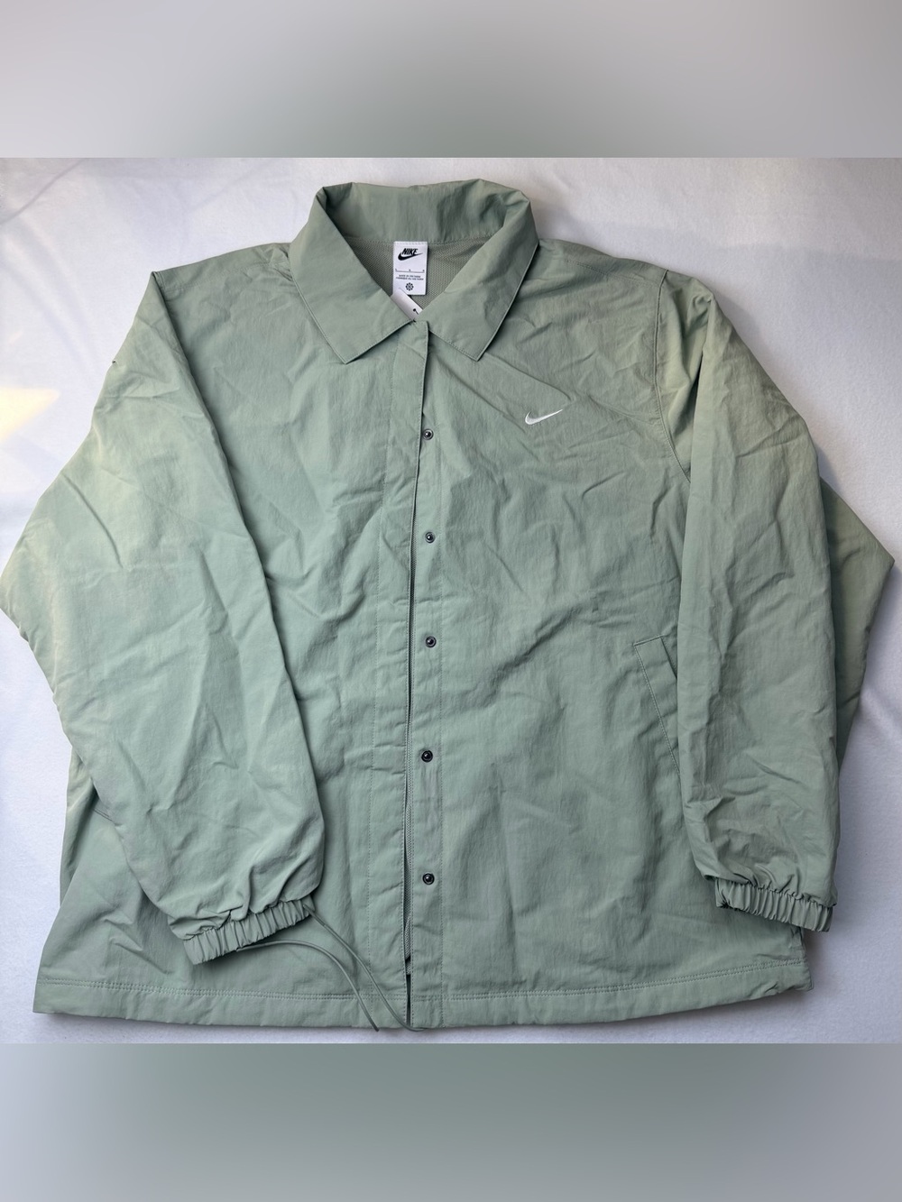 Nike Women’s Light Sage Oversized Green Utility Coach Jacket UPF 40+